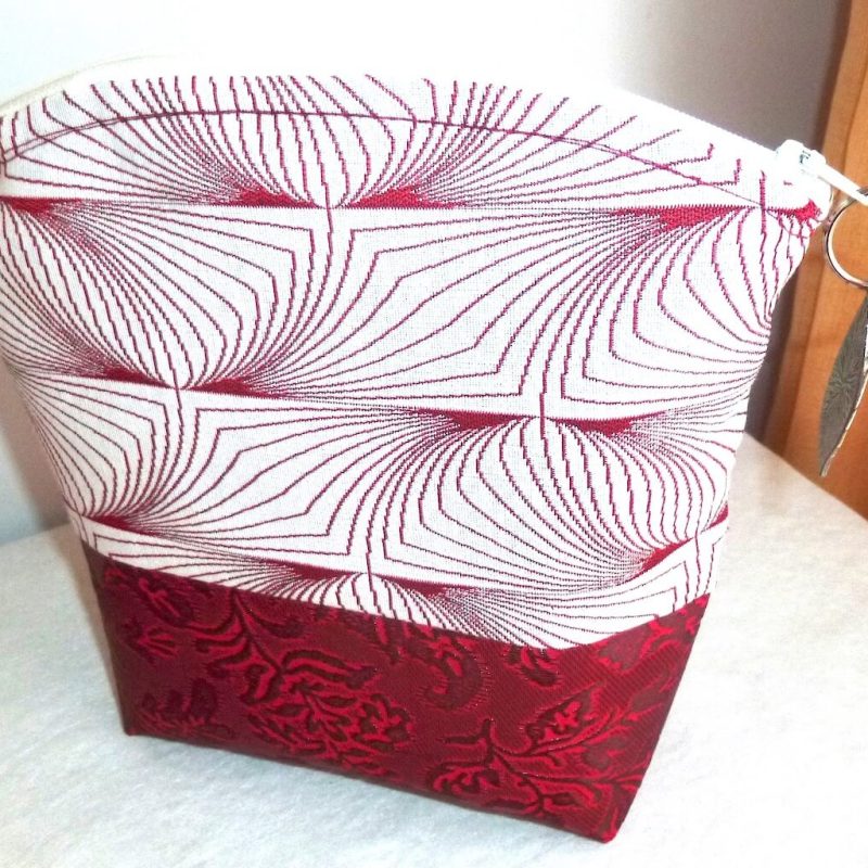 Pochette ronde SPIRALE SKAI bordeaux